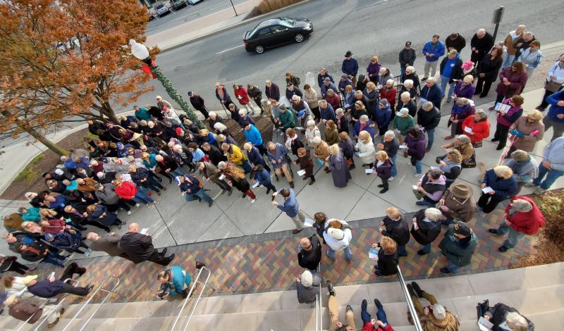 Nearly 100 people participated in praying the rosary on the steps of Rehoboth Beach City Hall Nov. 21. CHRIS FLOOD PHOTO